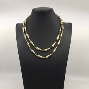 Lia Sophia Retired Rumor long antiqued brass gold tone matte cone necklace